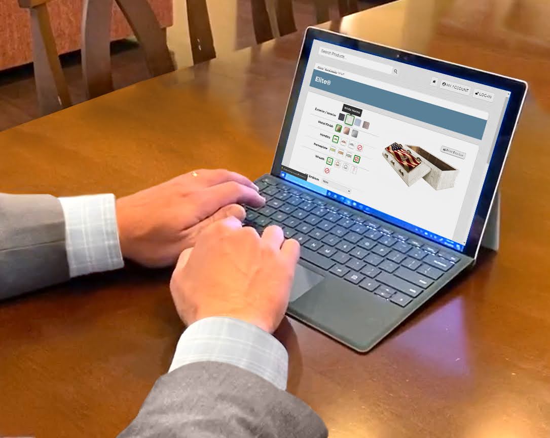 The funeral director ordering a custom burial vault from Trigard Vaults - working on administrative tasks