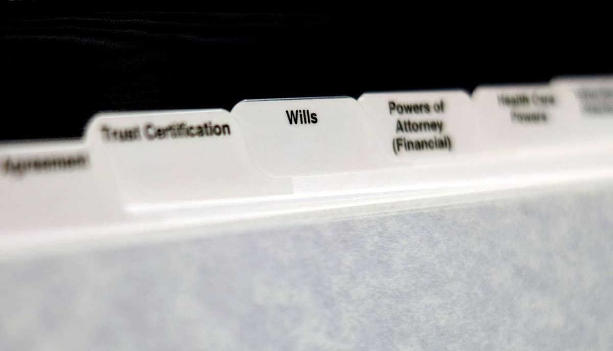 Files labeled "Trust Certification", "Wills", "Power of Attorney", and several others with the writing unclear